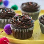 A plate of chocolate cupcakes.