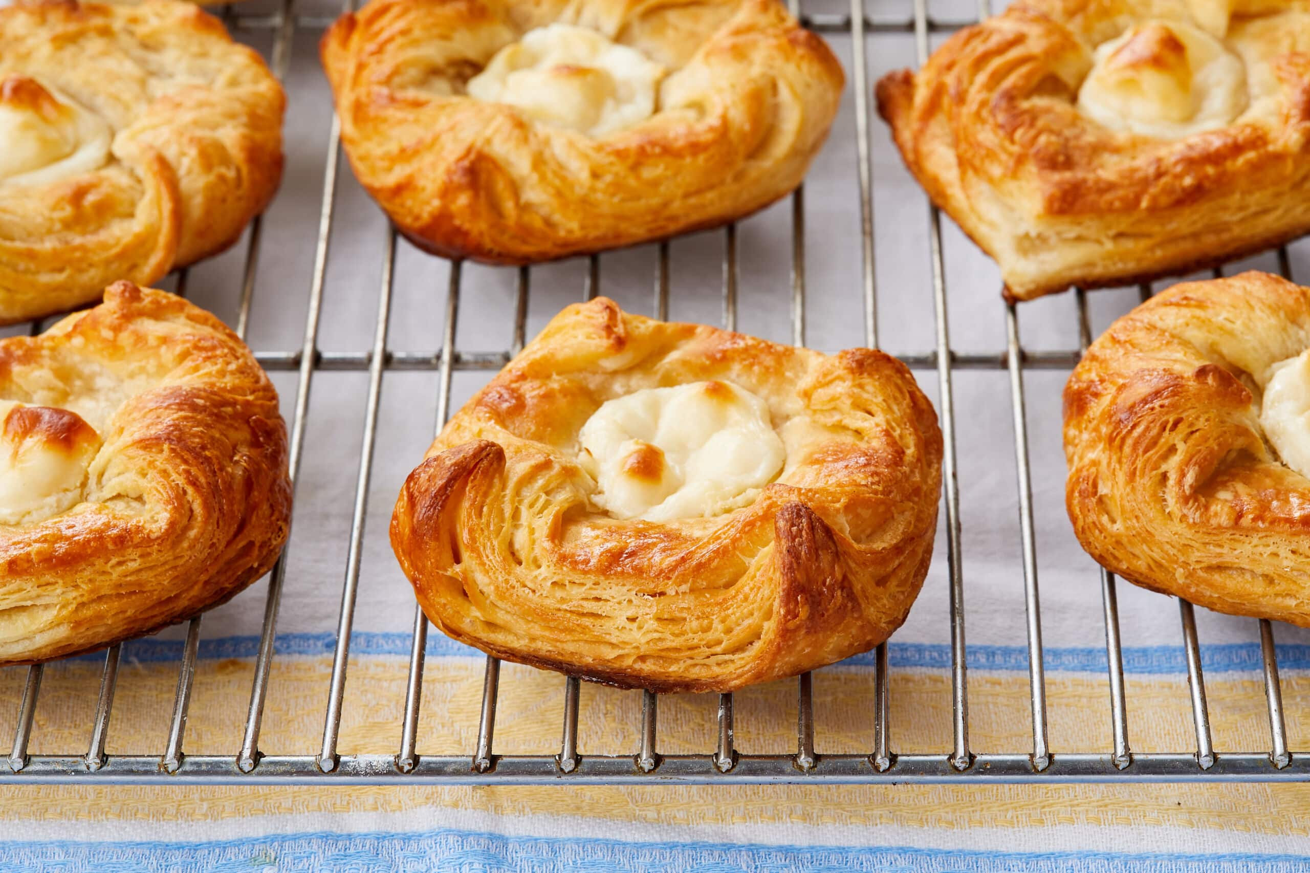 Cheese Danish are golden brown with flaky layers.