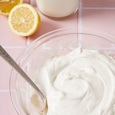 Homemade Cream Cheese made from milk and lemon juice is thick and creamy.