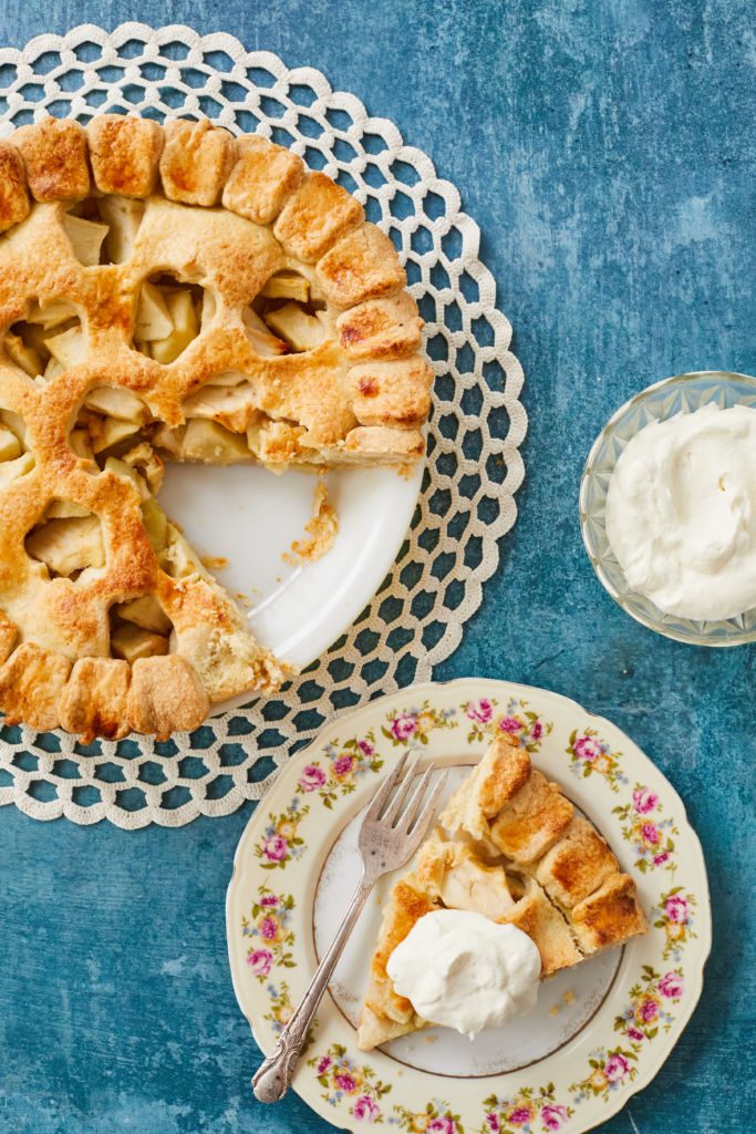 Golden Apple Tart is served with whipped cream