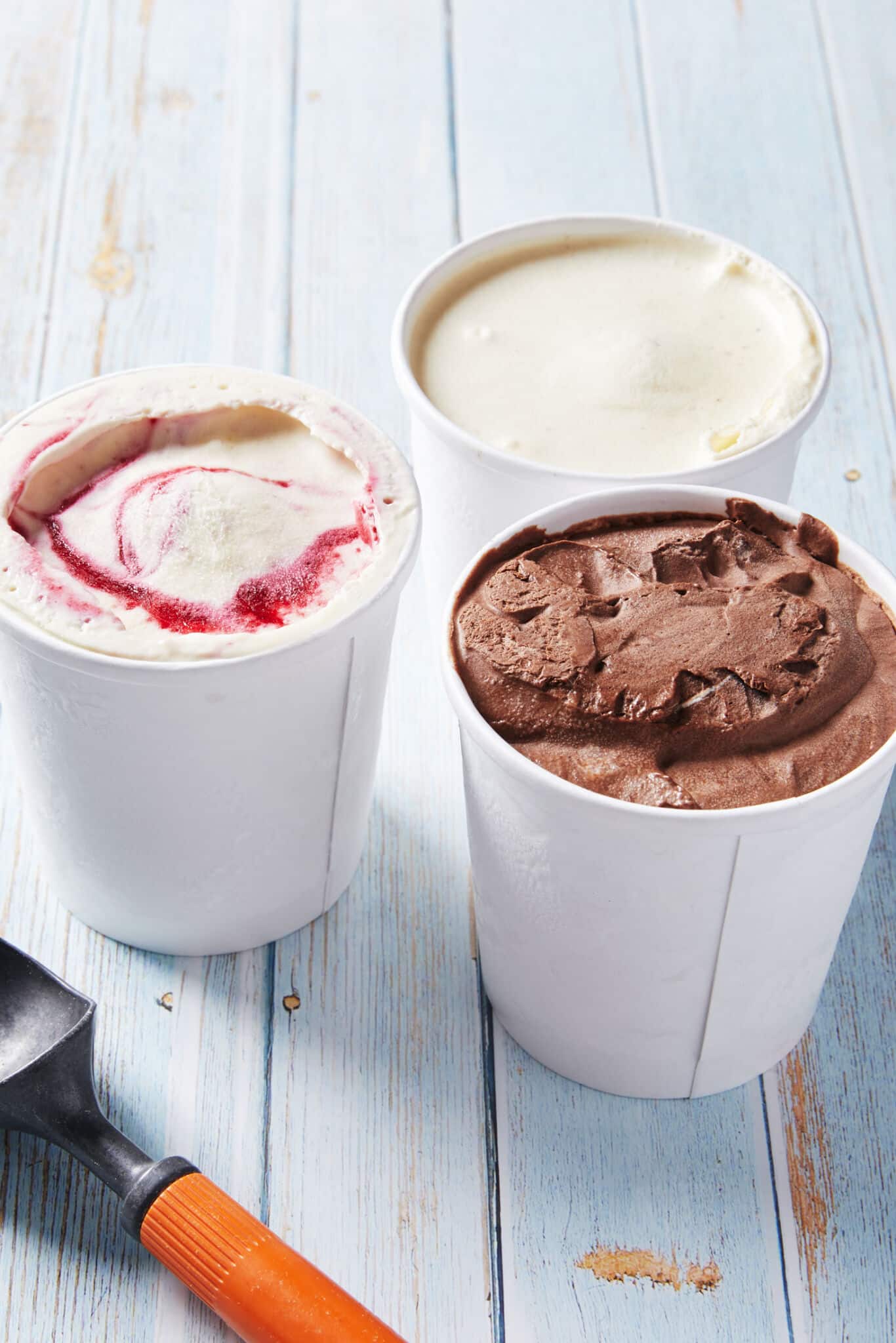 3 containers of No-Churn Artisanal Ice Cream : Vanilla Bean Flavor, Raspberry Ripple, and Double Chocolate.