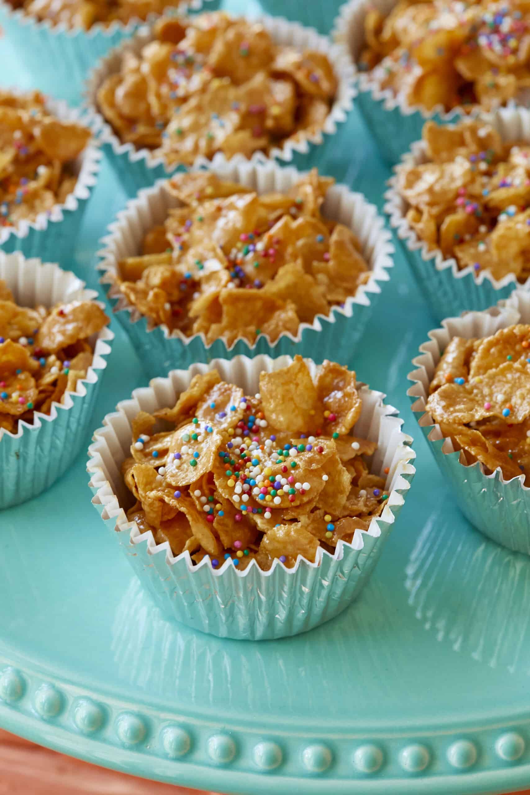 Australian Honey Joys are baked until crisp in cupcake cups then they are decorated with sprinkles.