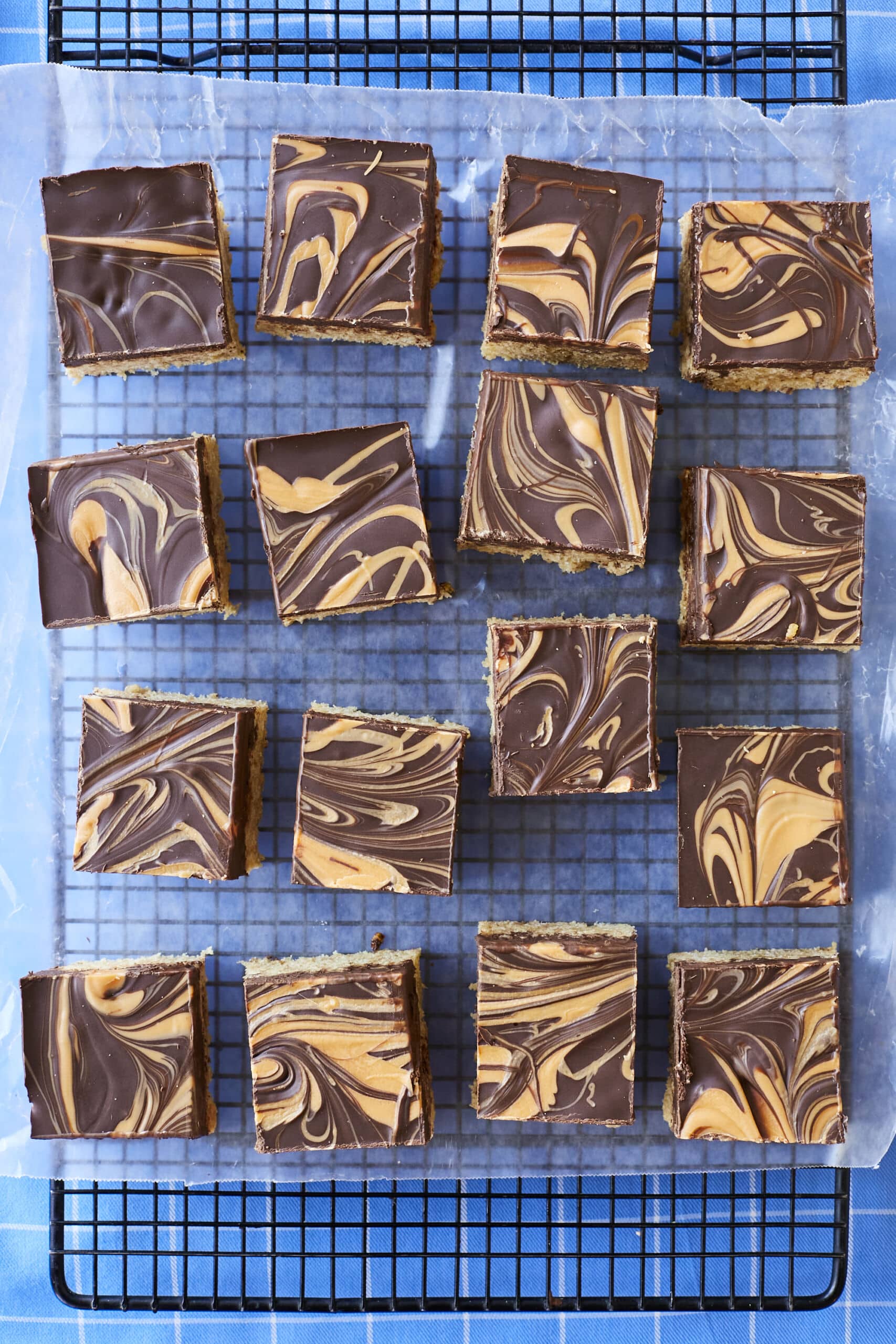 An overhead-shot of Easy Scotcheroos shows the swirls of peanut butter and shiny chocolate tops.