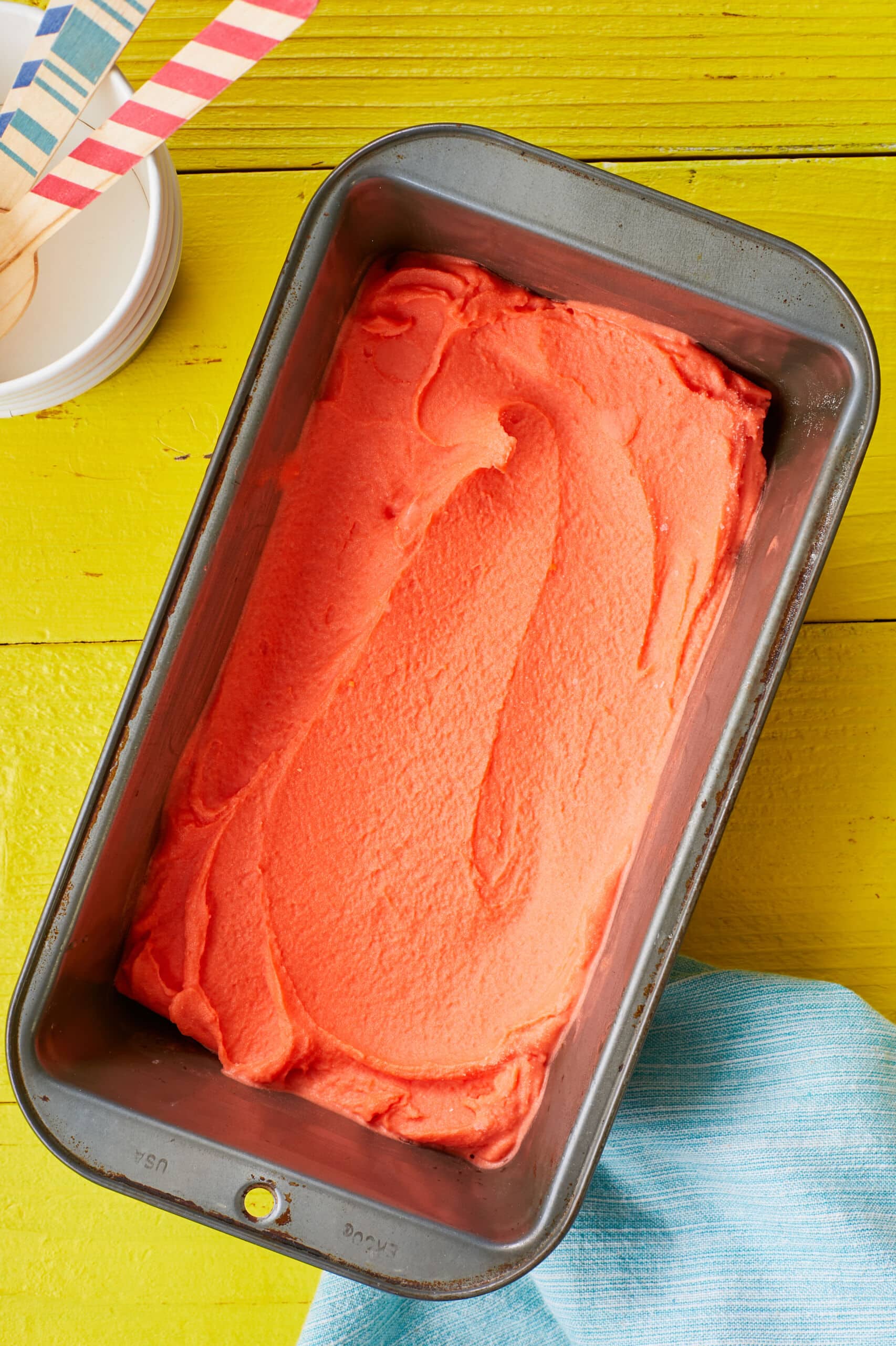 Smooth and thick Sicilian Eggless Watermelon Gelato in a loaf pan.